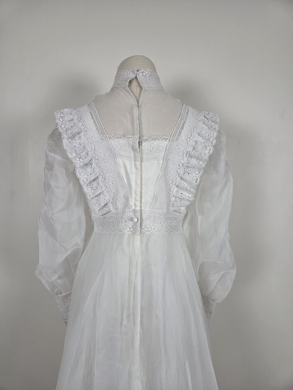 Victorian-Inspired White Lace Bridal Gown with High Neck and Sheer Puff Sleeves - Picture 6 of 13